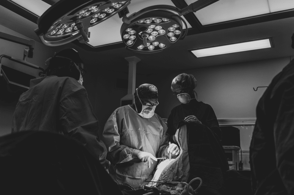 Surgeons in action in one of the theatres at JSH performing a modern surgical procedure.